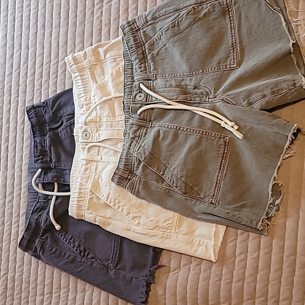 Shorts - 3 pair American Eagle size 6-8 in faded black, cream and olive drab.